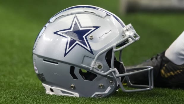 Oct 3, 2021; Arlington, Texas, USA; Detailed view of a Dallas Cowboys football helmet against the Carolina Panthers at AT&T Stadium.